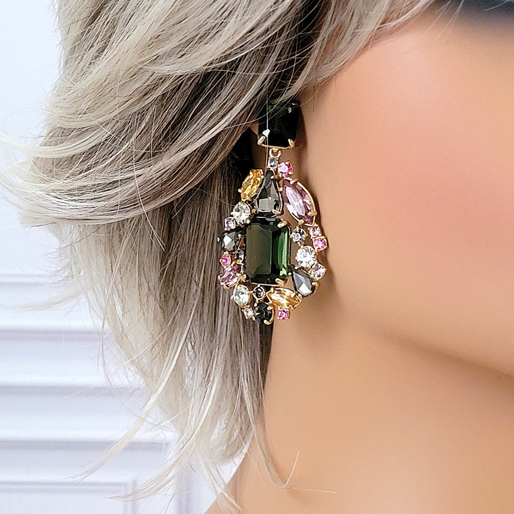 Big rhinestone dangle earring on mannequin.