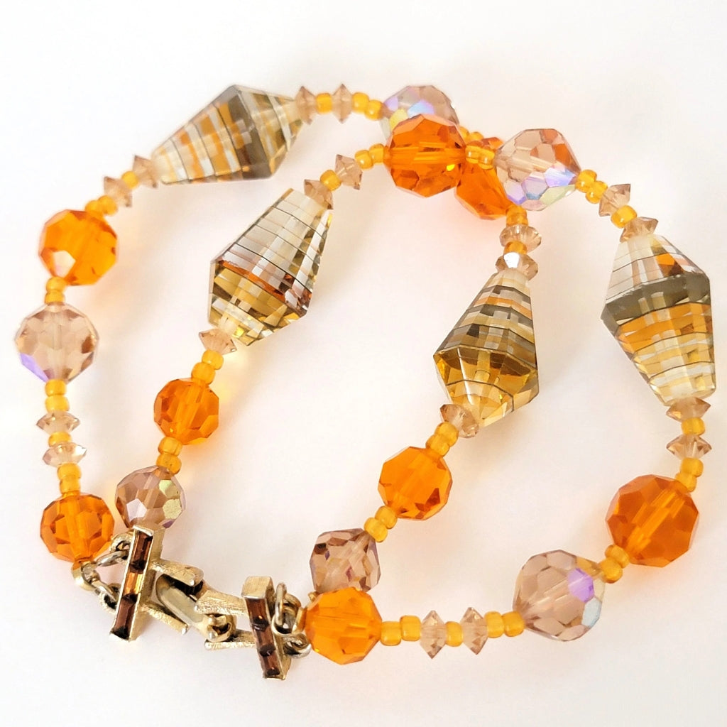 Vintage orange glass two strand beaded bracelet.