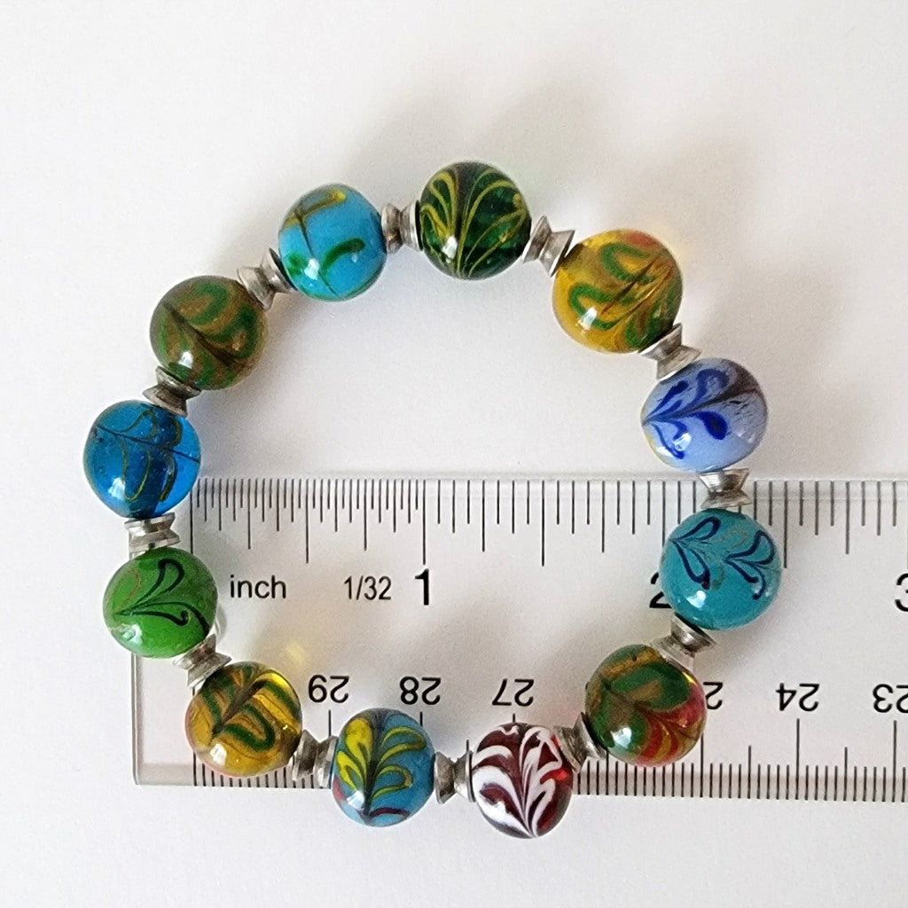 Glass beaded bracelet with ruler.