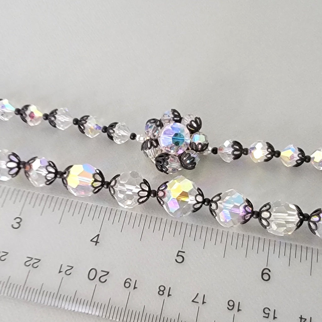 Vintage aurora borealis beads and clasp with ruler.