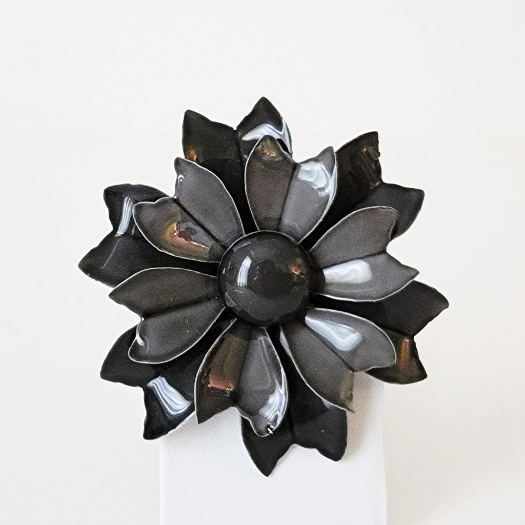 Vintage black and gray enamel flower pin.