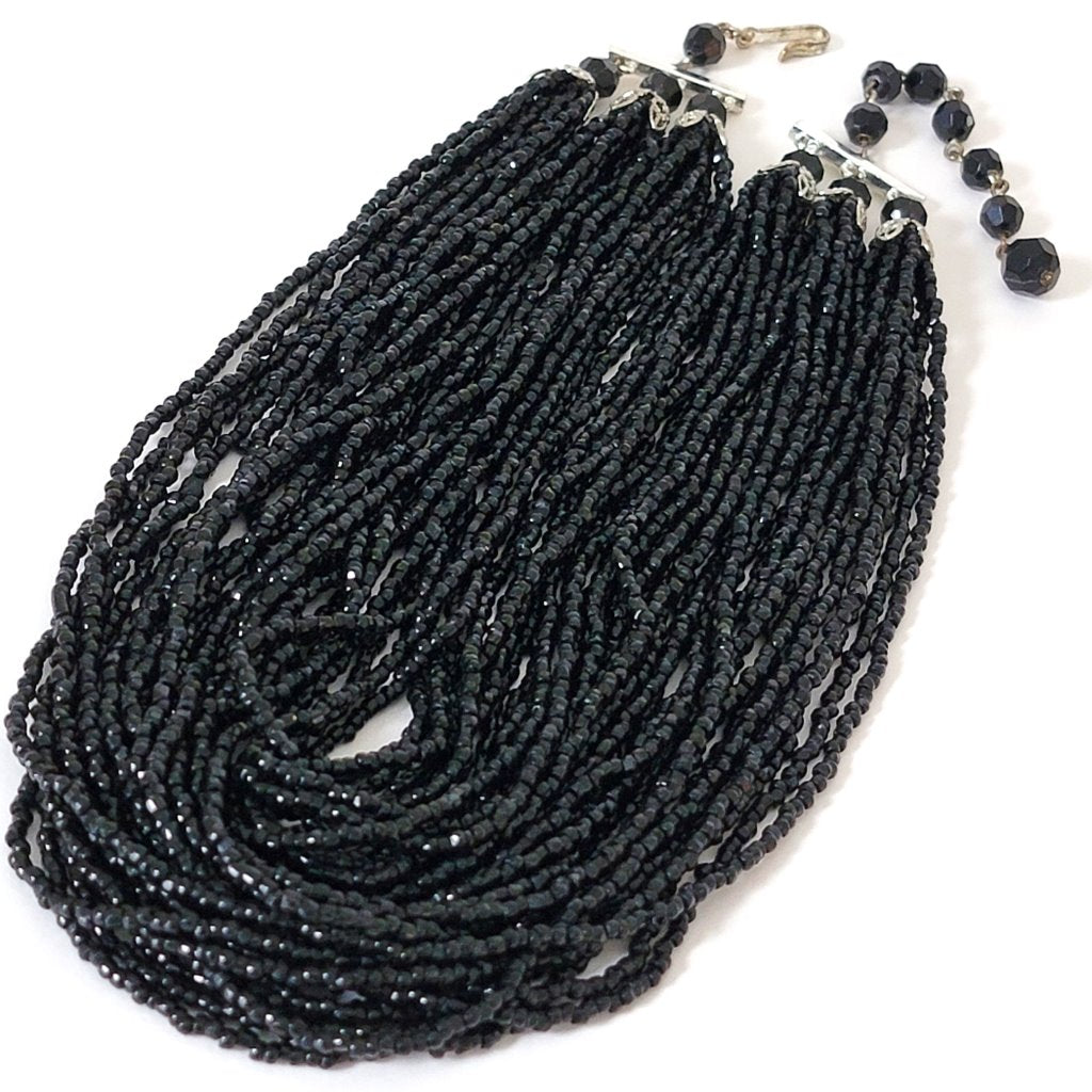 Black seed bead torsade necklace.
