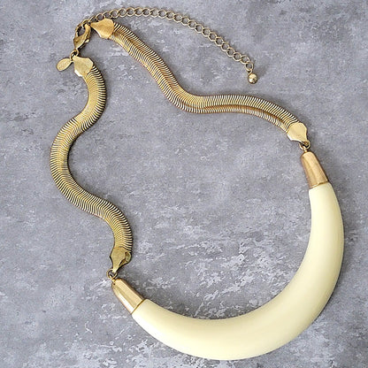 Curved cream acrylic statement choker necklace.