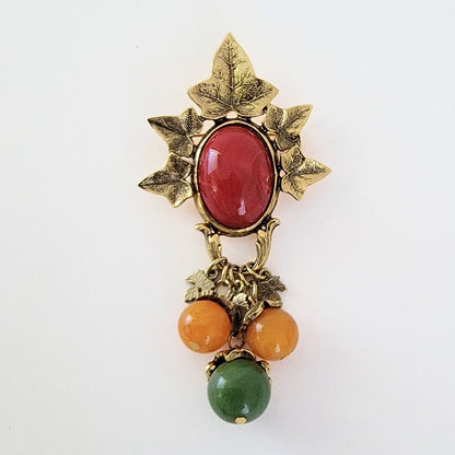 Fall color leaf brooch with dangling beads.