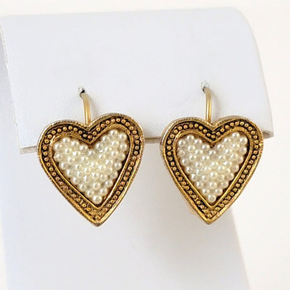 Faux pearl heart earrings.