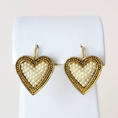 Express heart earrings.