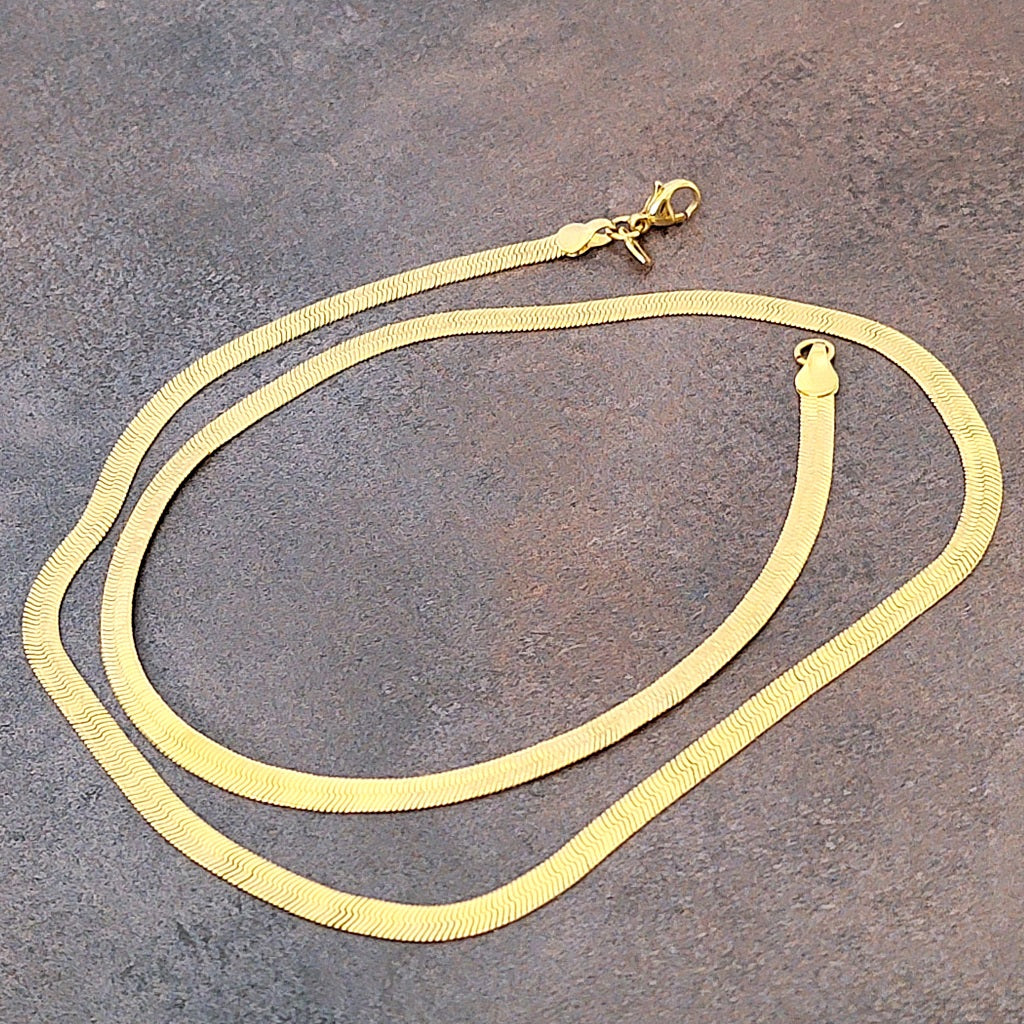 Monet gold tone flat chain necklace.