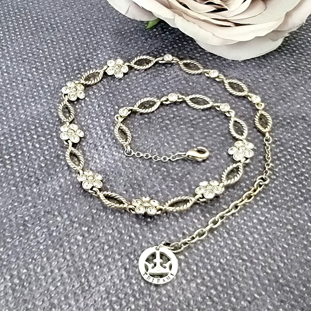 Trifari vintage silver tone floral necklace, with logo tag.