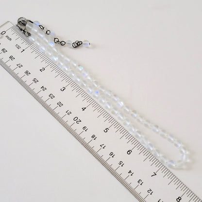 Glass beaded necklace with ruler.
