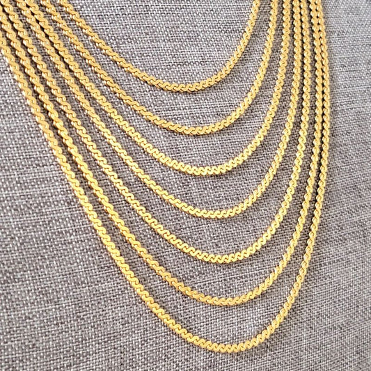 Gold tone chains.