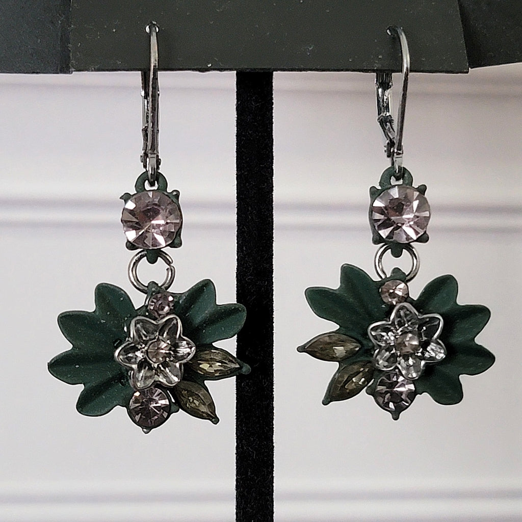 Green enamel flower and rhinestone dangle earrings.