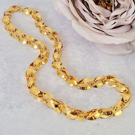 Gold tone oval link choker necklace.