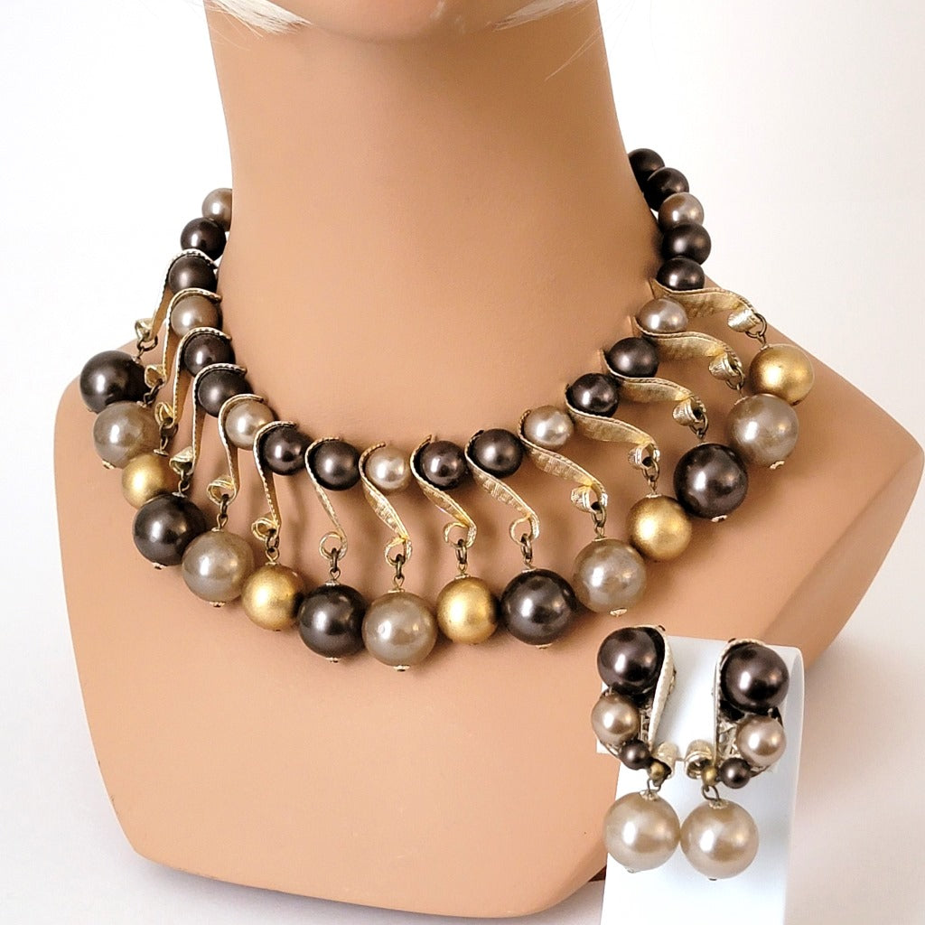 Brown and gold jewelry set.