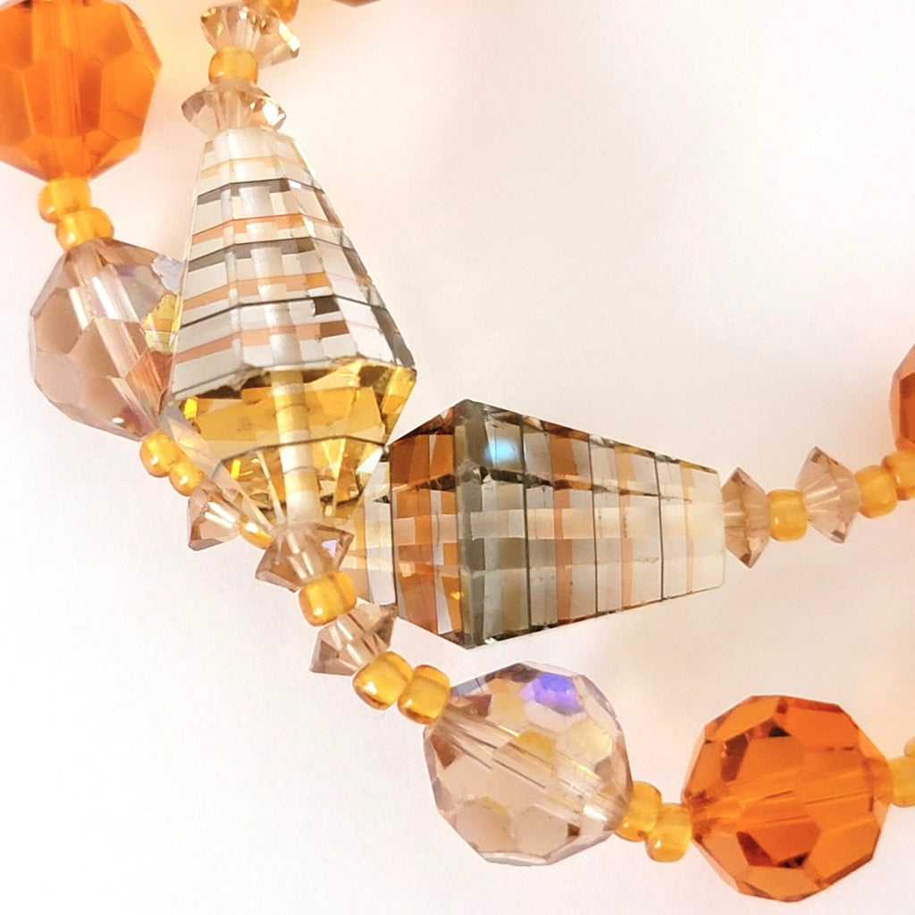 Orange vintage laminated glass beads.