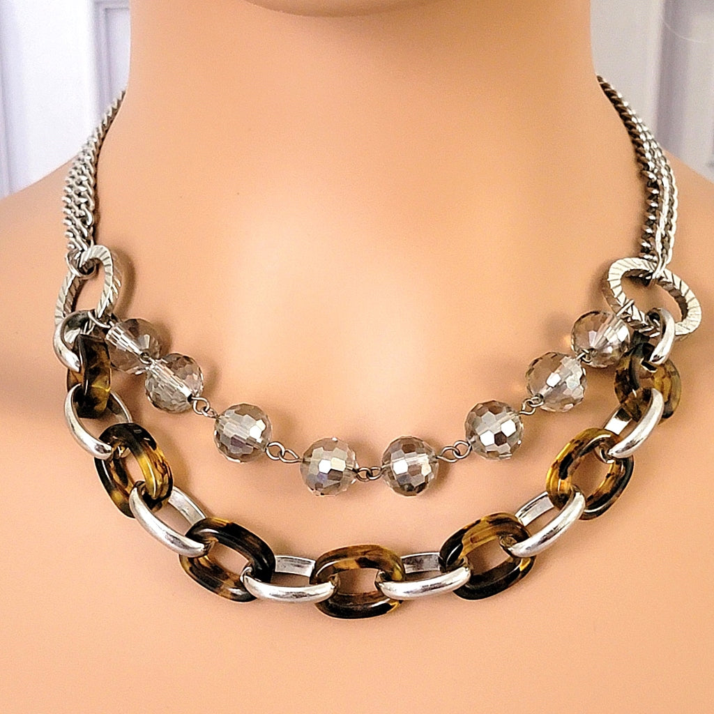 Statement choker necklace with tortoise links and glass beads.