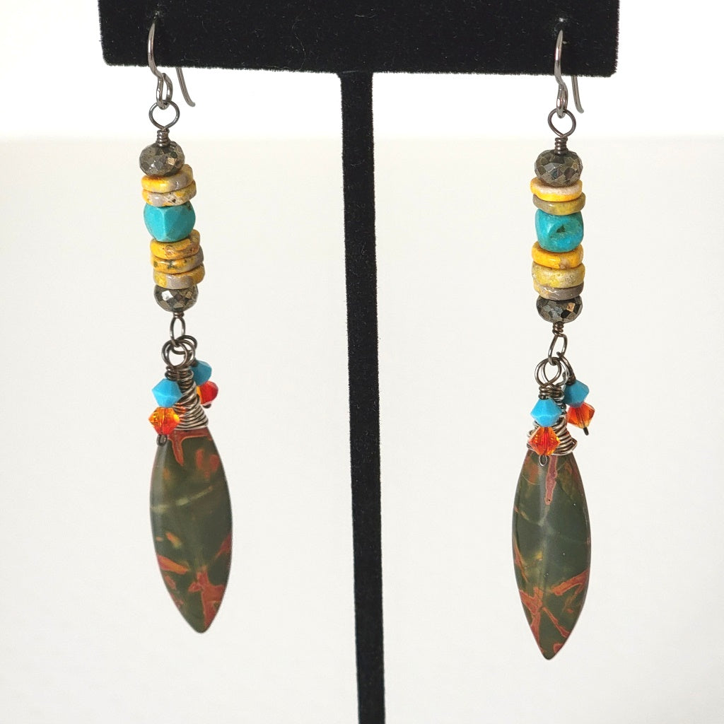 Long gemstone and crystal dangle earrings.