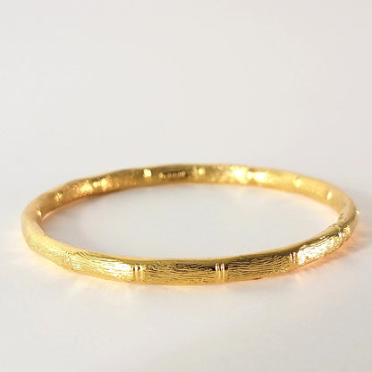 Vintage gold tone bangle bracelet.