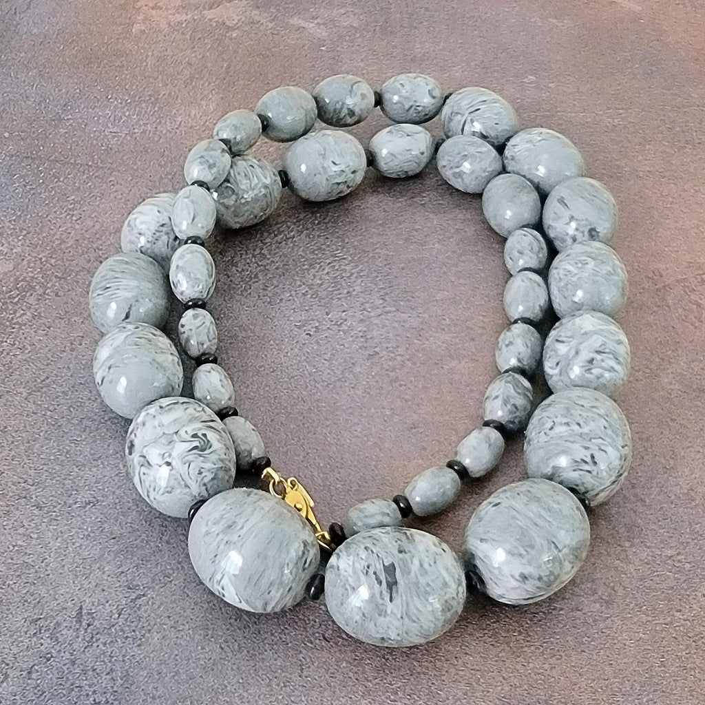 Big gray acrylic beaded necklace.