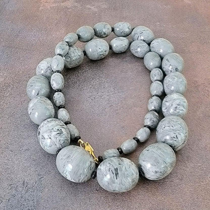 Big gray acrylic beaded necklace.