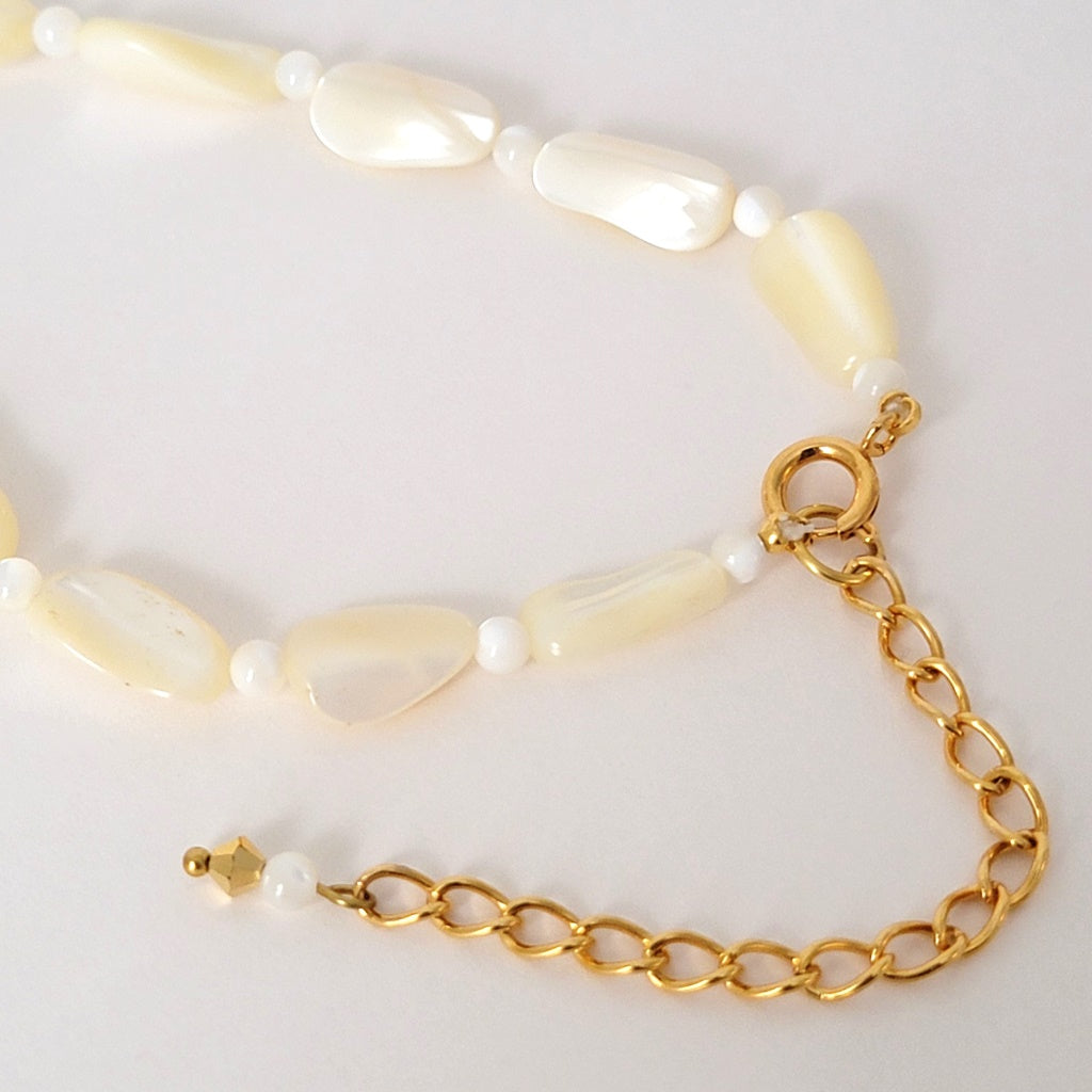 Gold plated extender chain and necklace clasp.