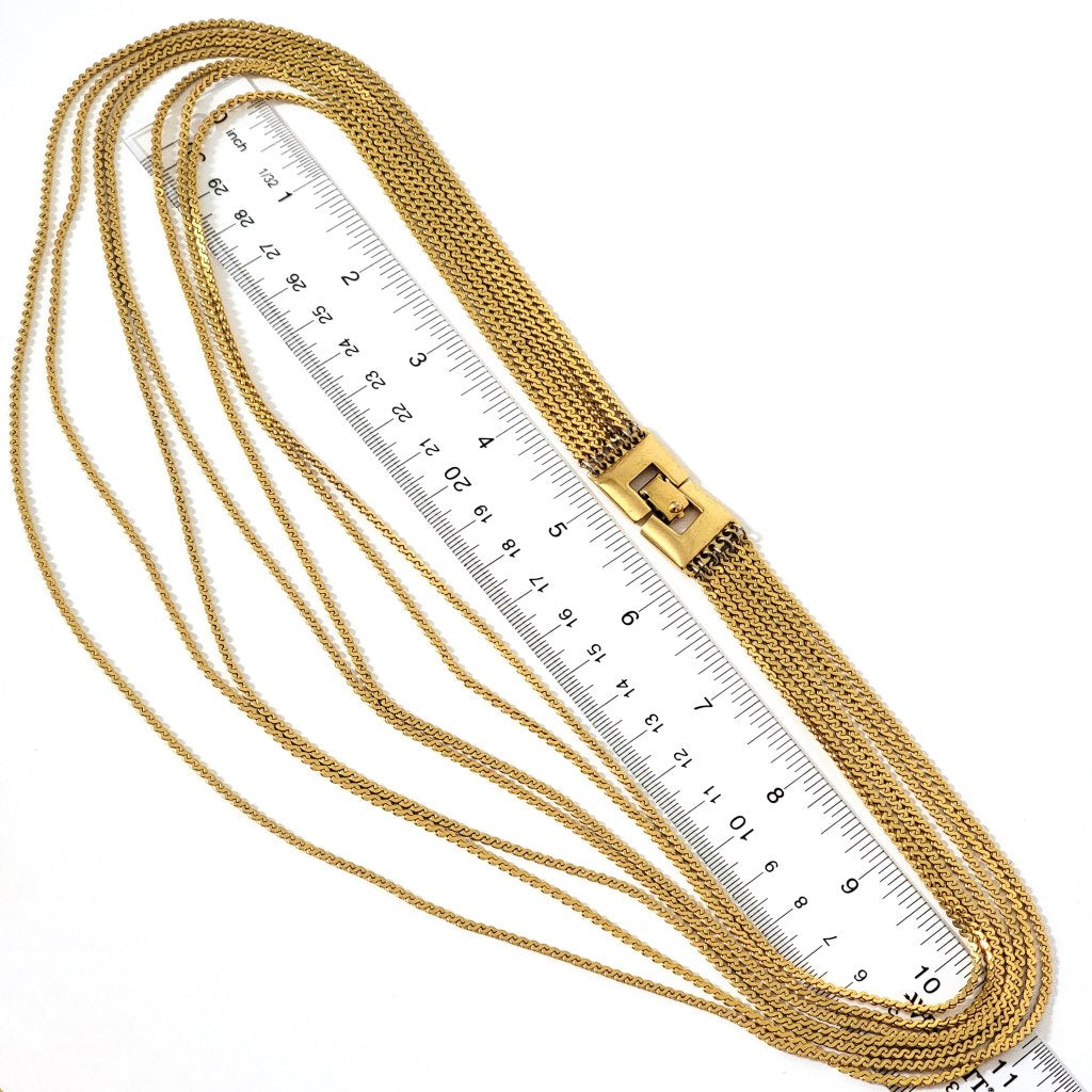 Necklace with ruler.