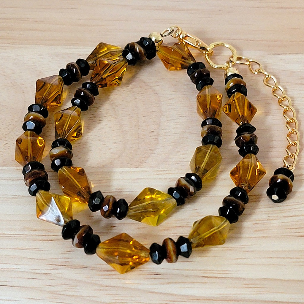 Orange and black Czech glass necklace.