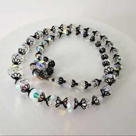 Vintage aurora borealis beaded necklace with black acceents.