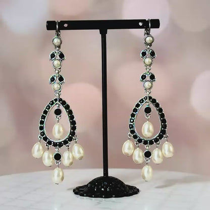 Long dangle earrings.