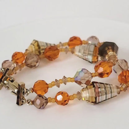 Vendome orange beaded bracelet.