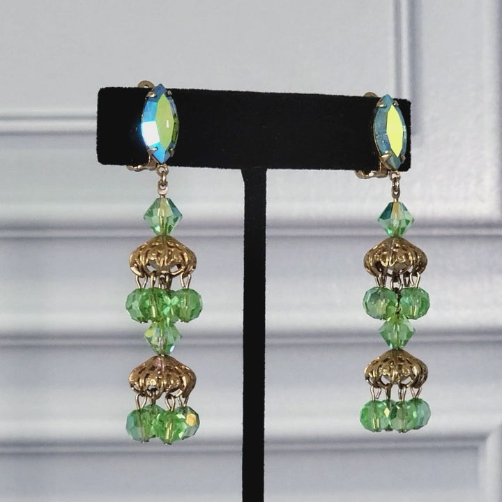 Long green glass chandelier mod style earrings.