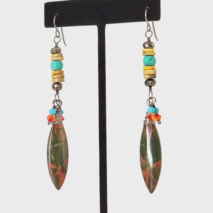 Video of long, handmade jasper gemstone dangle earrings.