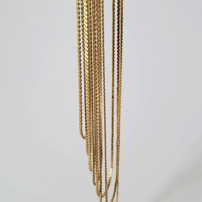 Seven strand chain necklace.