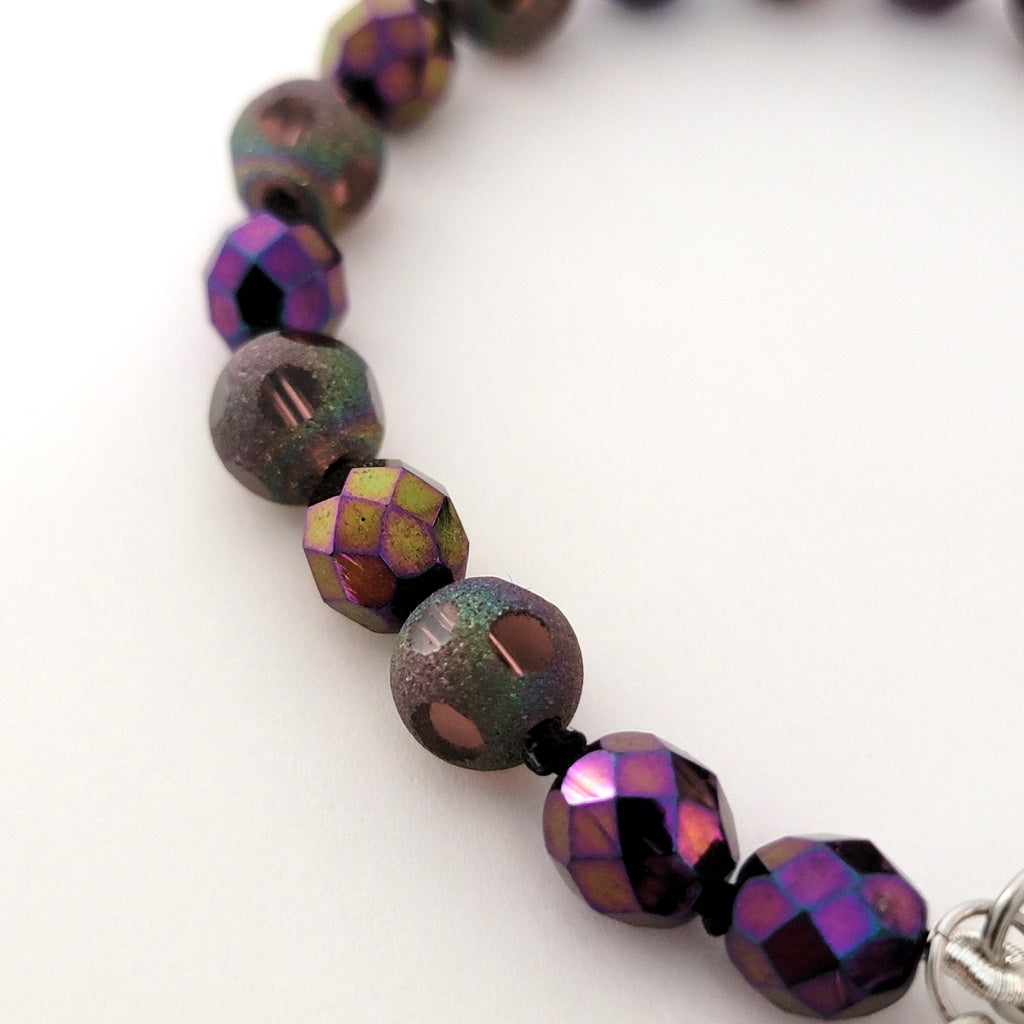 Purple faceted glass beads.