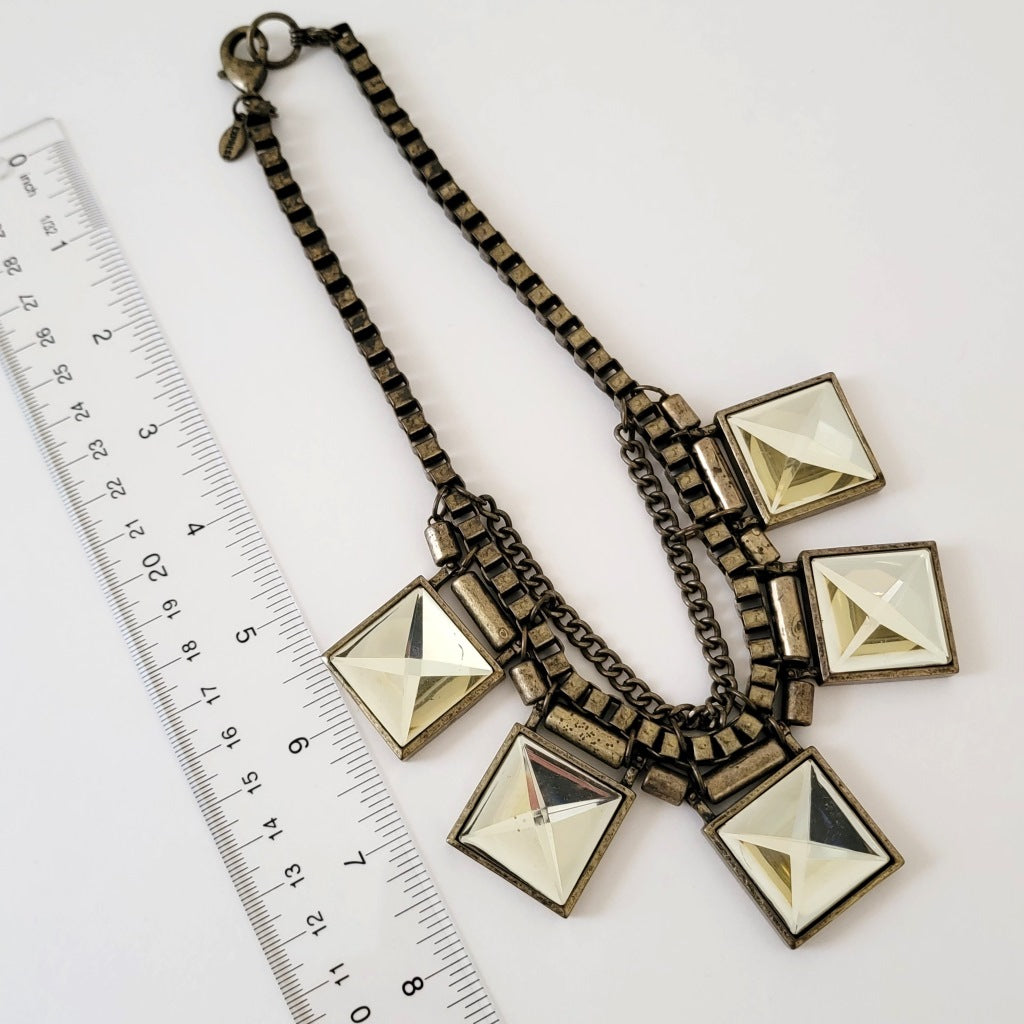 Necklace with ruler.