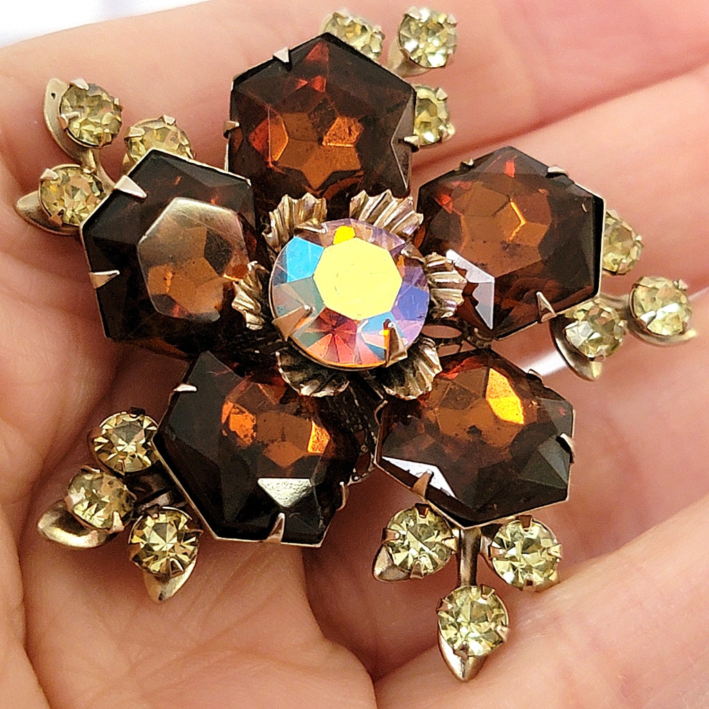 Hexagon shaped vintage rhinestone pin in brown and yellow.