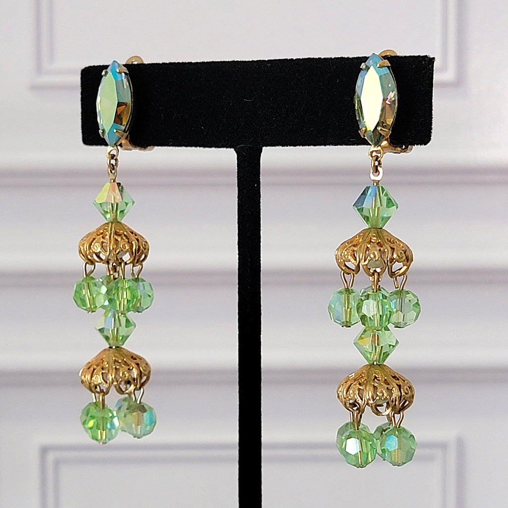 Green rhinestone and glass beaded long dangle earrings.