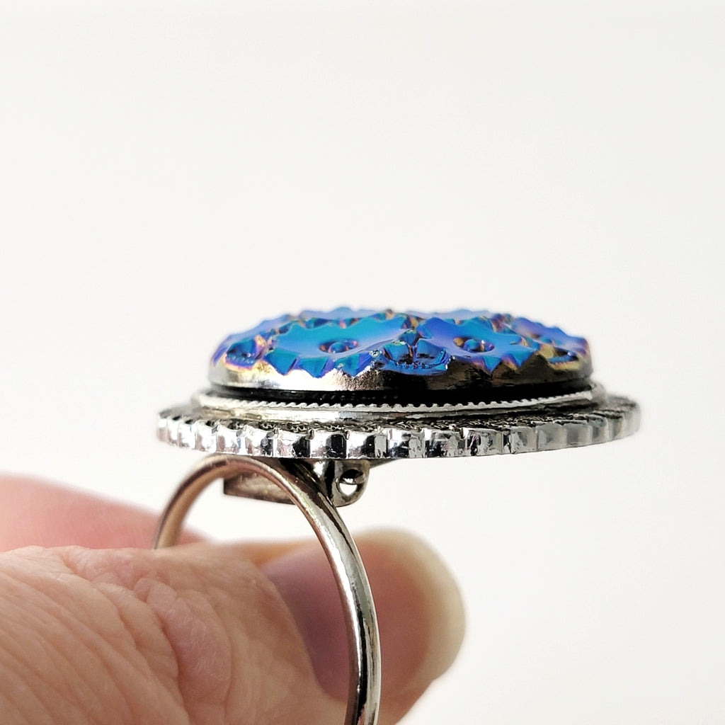 Lucite cabochon in a jewelry setting.