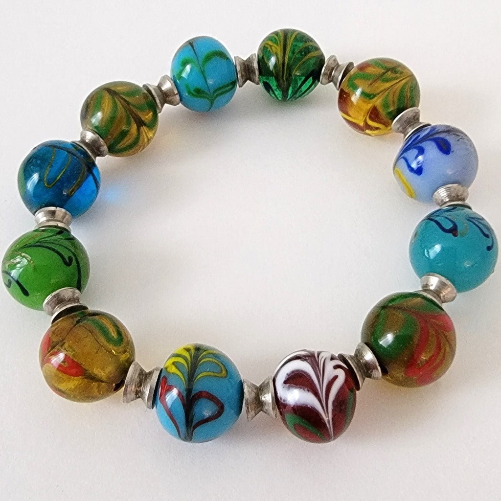 Art glass bead bracelet with hearts.