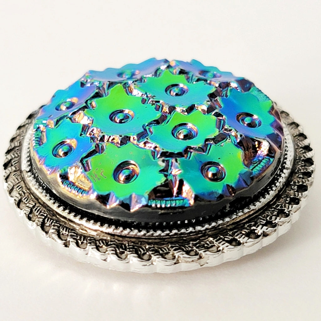 Blue and green floral lucite cabochon.