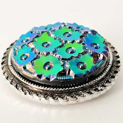 Blue and green floral lucite cabochon.