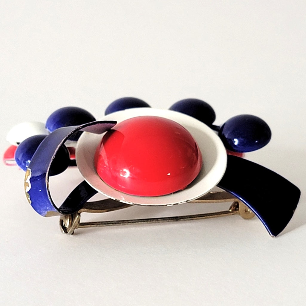 Top of mod style brooch.