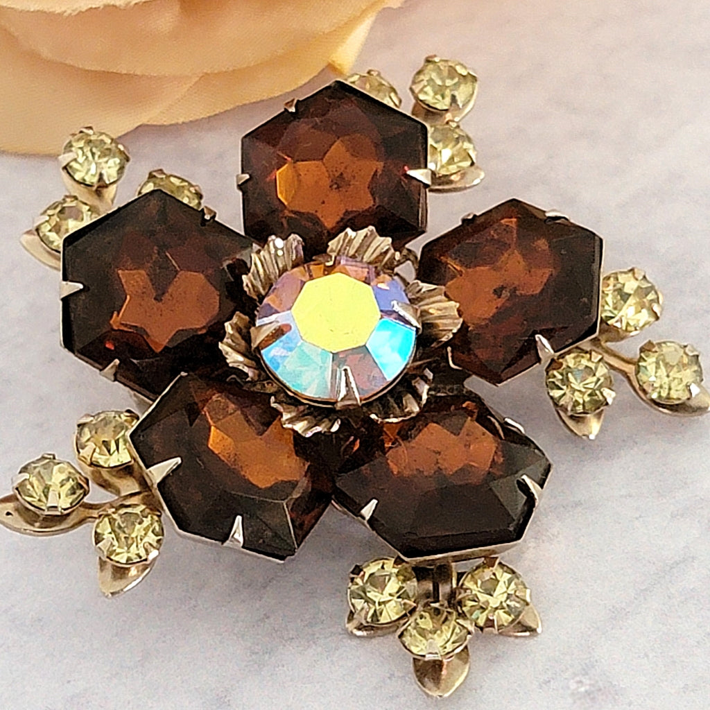 Topaz rhinestone and yellow crystal brooch.