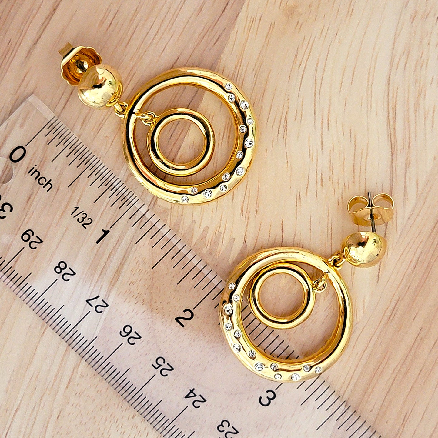 Hoop earrings with ruler.