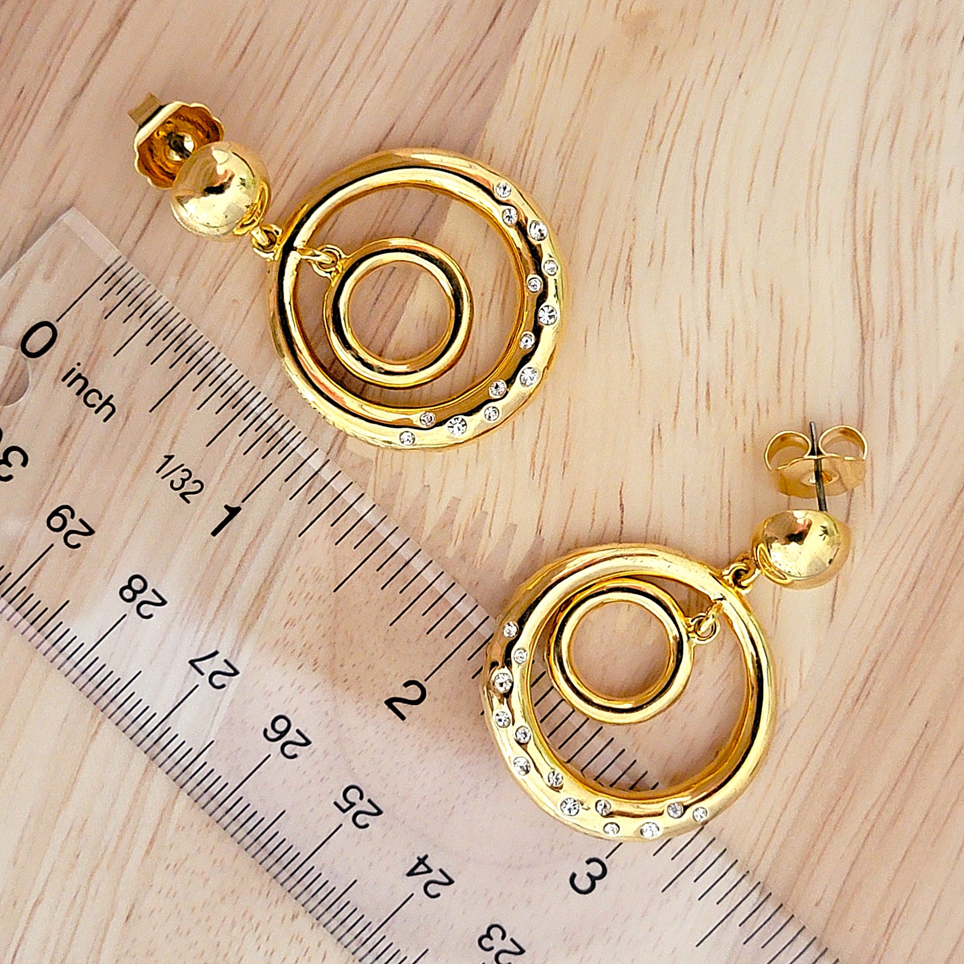 Hoop earrings with ruler.