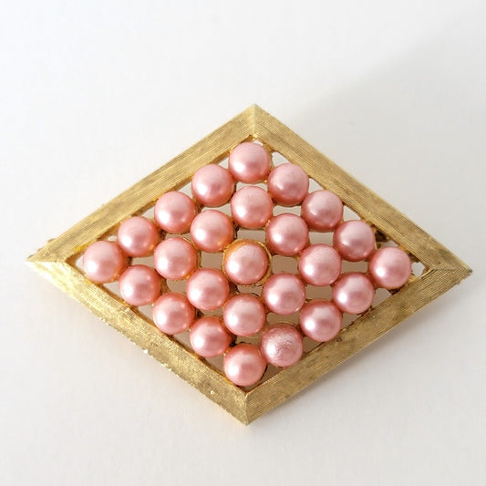 Vintage pink faux pearl brooch.
