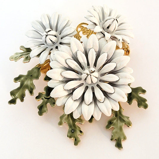 White flower pin.