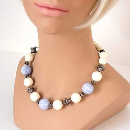 Chunky Dauplaise blue beaded choker on a mannequin.