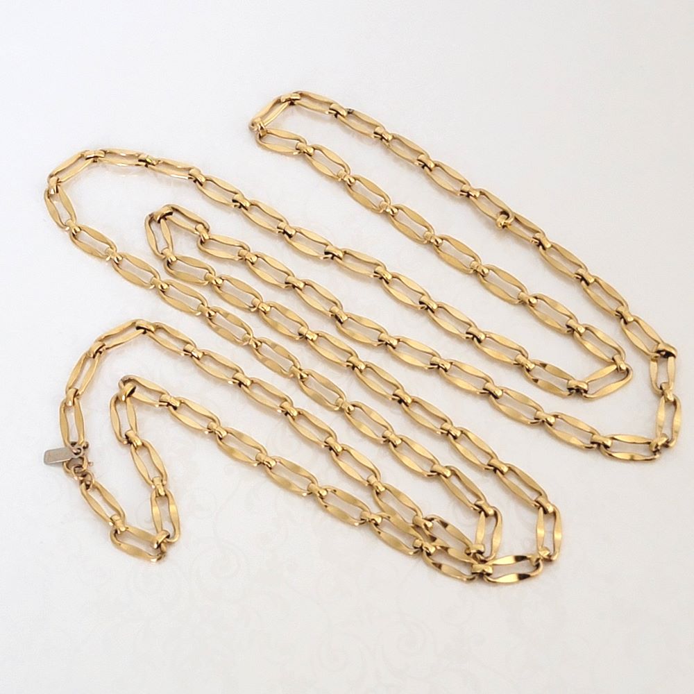 Long gold tone Monet necklace, with oval links.